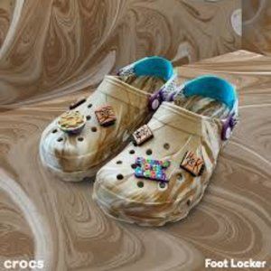 NEW. CROCS x CINNAMON TOAST CRUNCH. WOMEN'S SIZE 8 MEN’S SIZE 6.